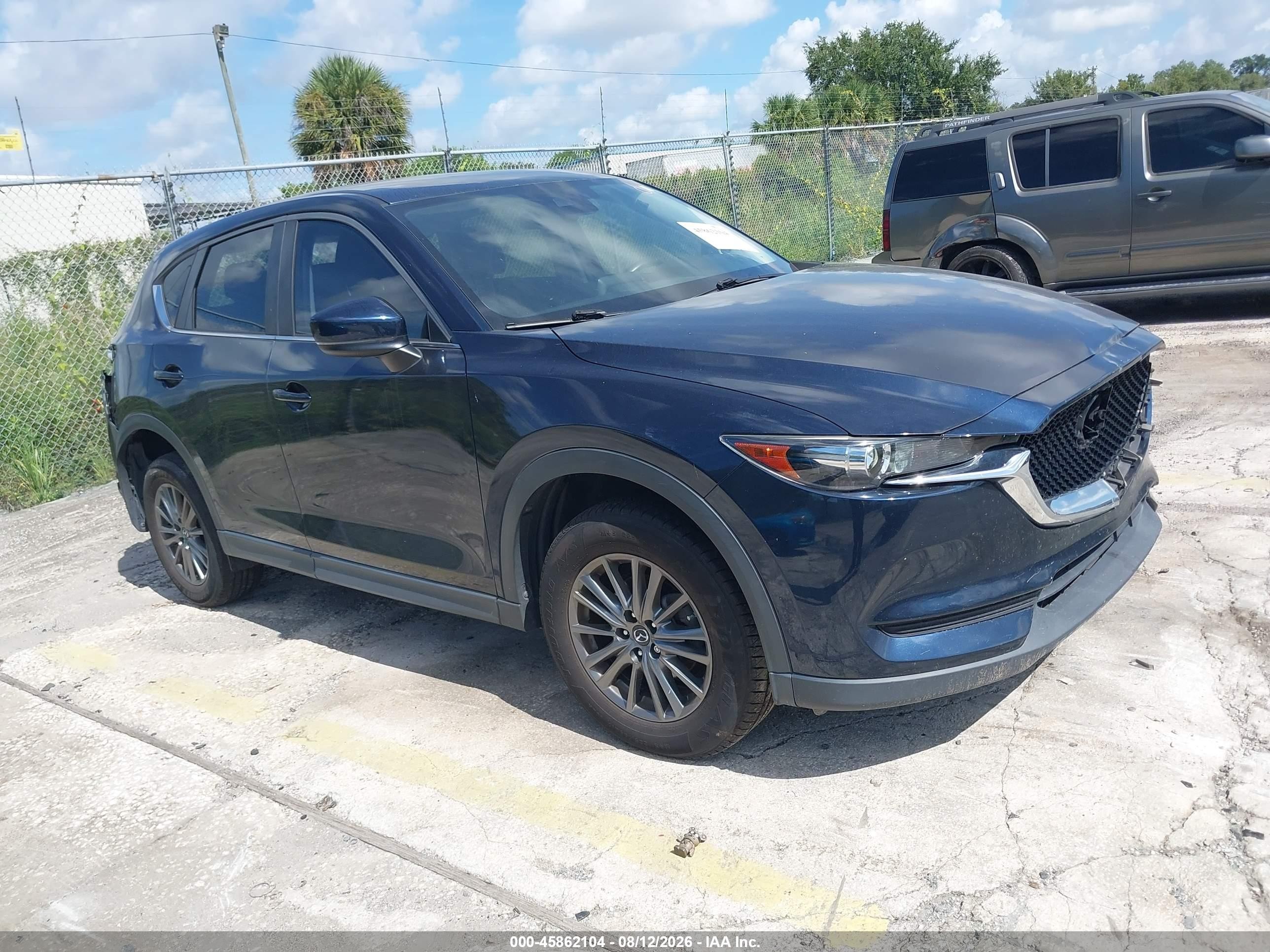 2017 Mazda CX-5 Touring, VIN JM3KFACL9H0192251 — Rear end