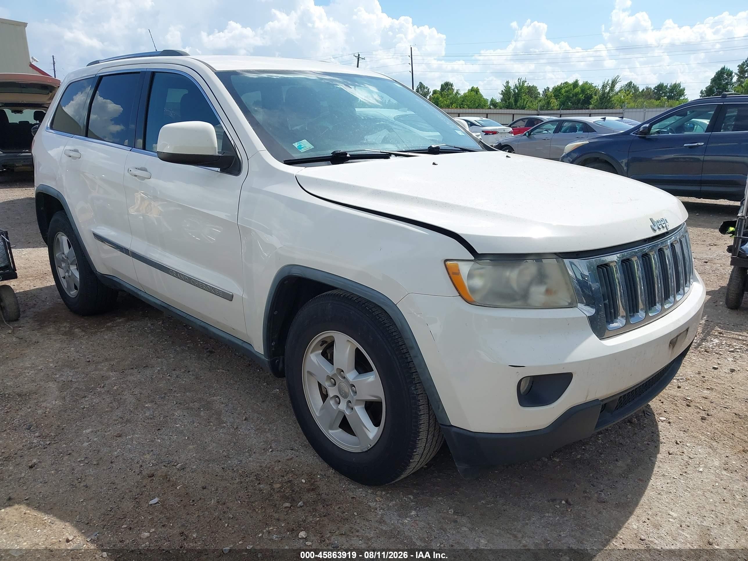 2011 Jeep Grand Cherokee Laredo, VIN 1J4RS4GG7BC524592 — Normal wear