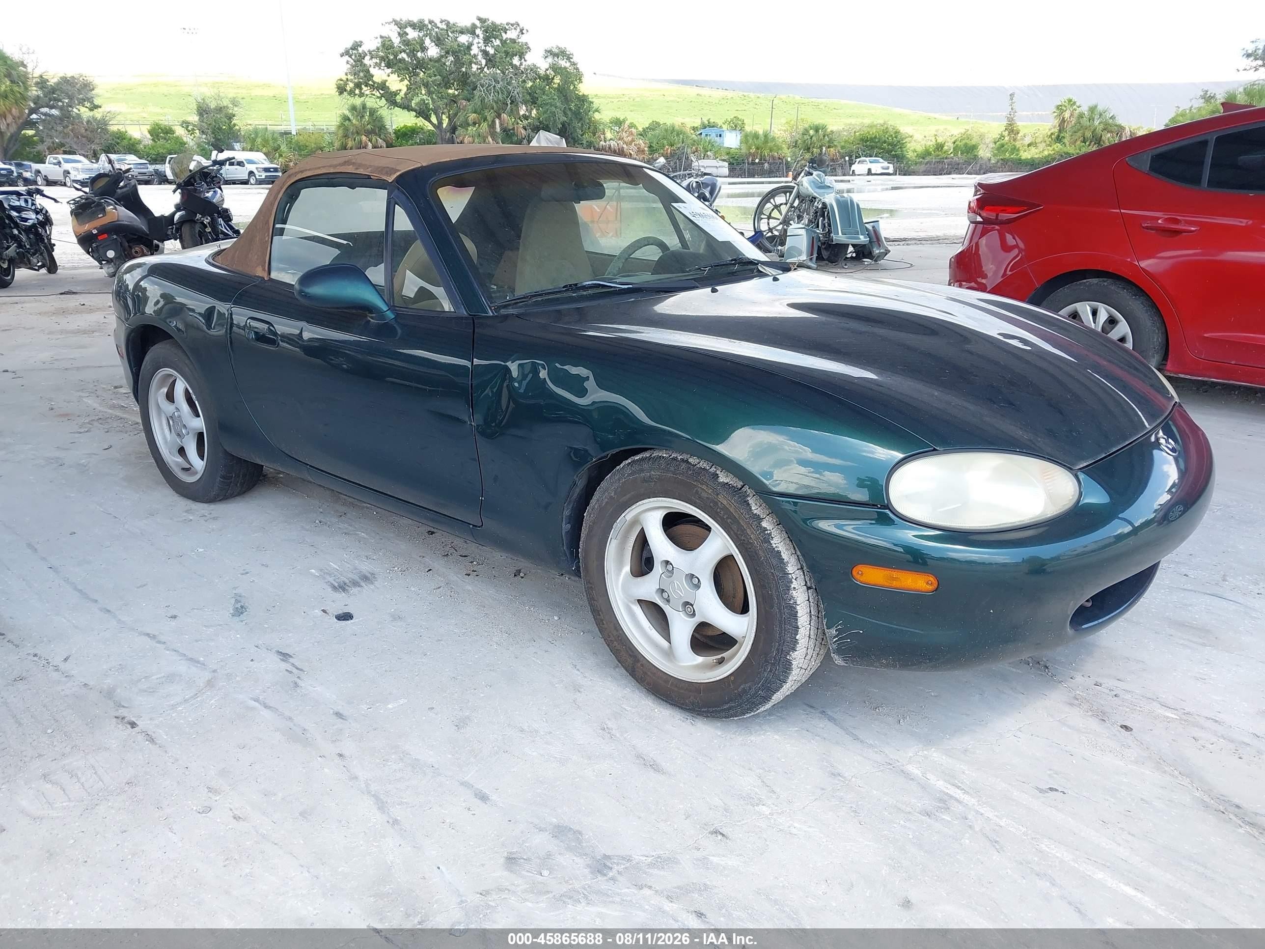 1999 Mazda MX-5 Miata, VIN JM1NB3531X0125698 — Normal wear