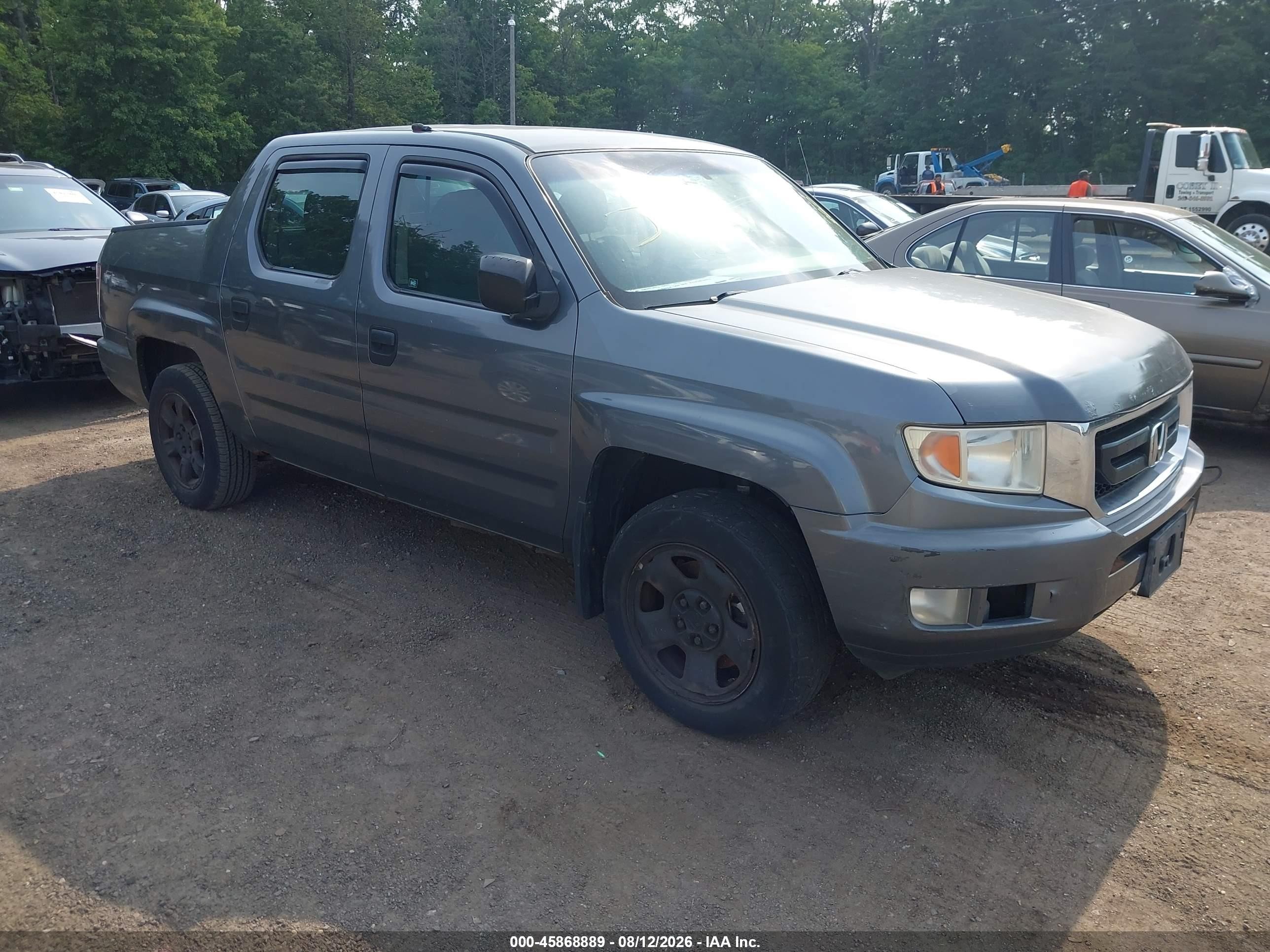 2011 Honda Ridgeline RT, VIN 5FPYK1F28BB003008 — Normal wear