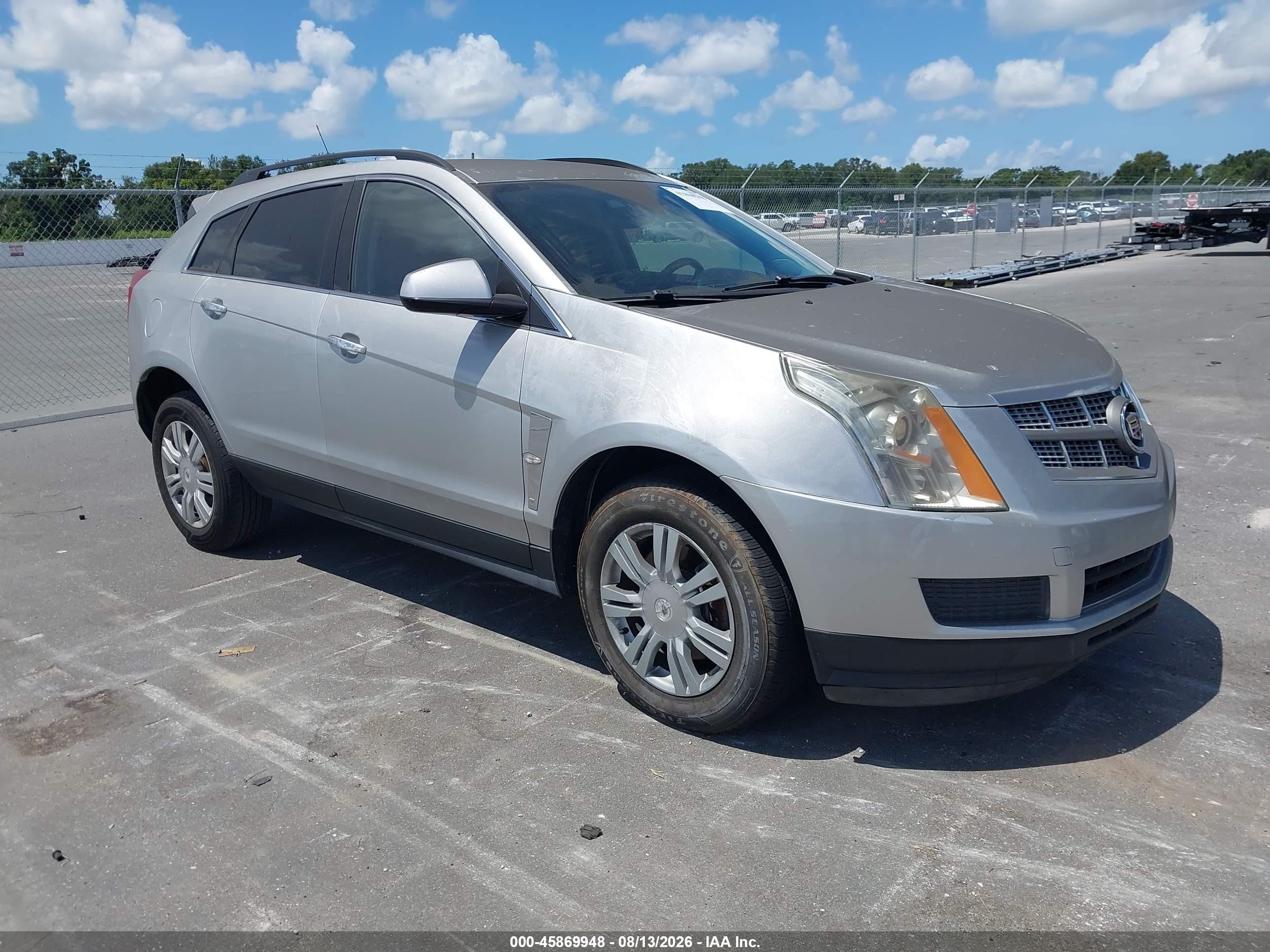 2011 Cadillac SRX, VIN 3GYFNGEYXBS613705 — Normal wear