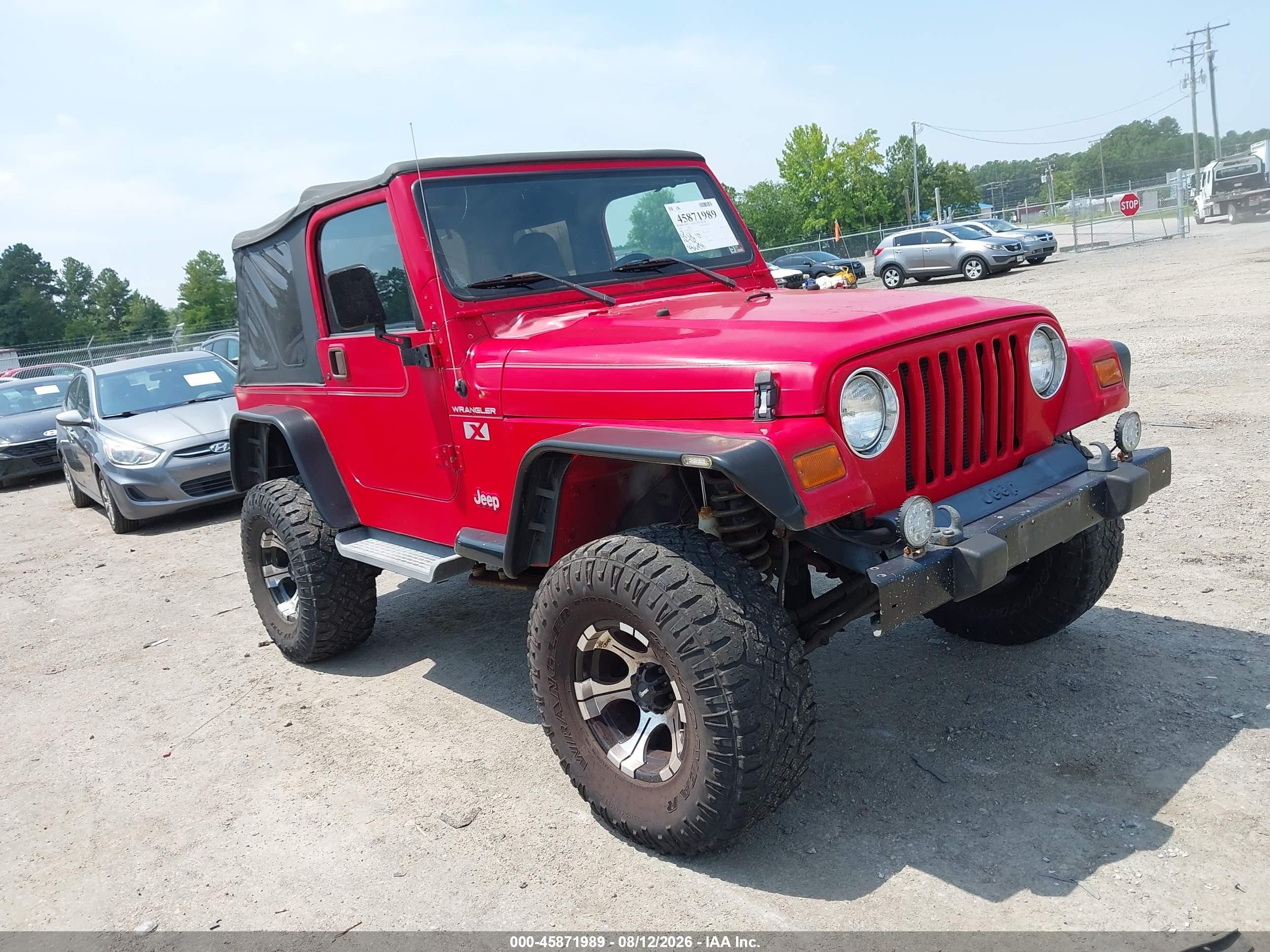 2002 Jeep Wrangler X, VIN 1J4FA39S32P726811 — Normal wear
